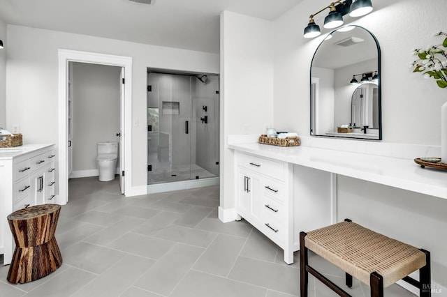 40 Los Pinos, Nicasio, CA 94946 - bathroom featuring toilet, vanity, visible vents, a stall shower, and baseboards