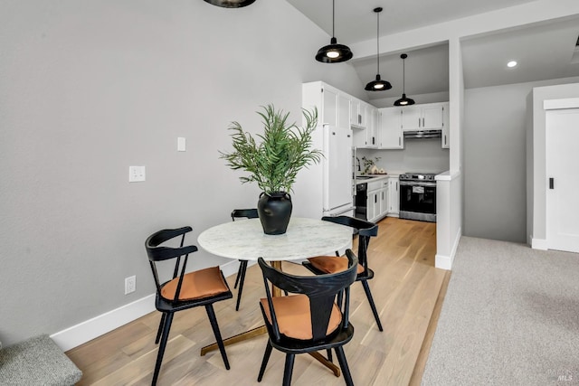 40 Los Pinos, Nicasio, CA 94946 - dining area with lofted ceiling, baseboards, and light wood-style flooring