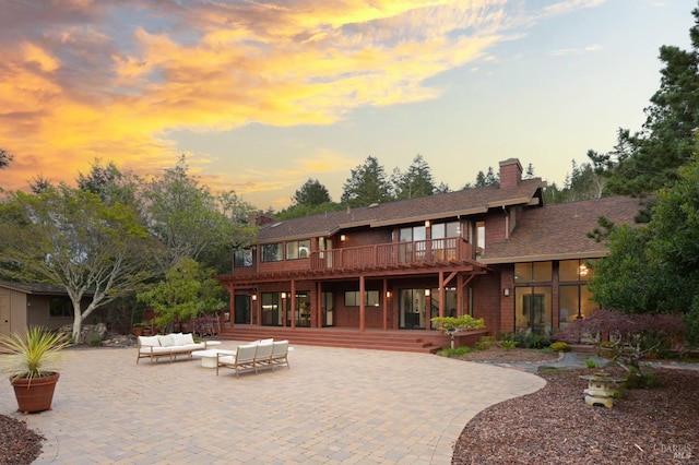 40 Los Pinos, Nicasio, CA 94946 - rear view of property with an outdoor living space, a chimney, a patio area, and a wooden deck