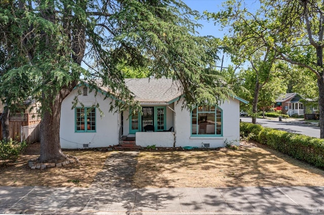 1531 F St, Napa, CA 94559 - view of front of house with stucco siding, roof with shingles, and fence