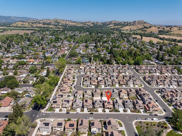 aerial view with a mountain view and a residential view