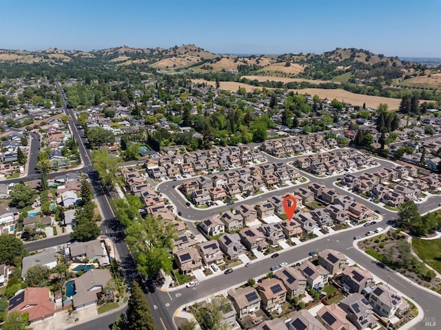 drone / aerial view with a mountain view and a residential view