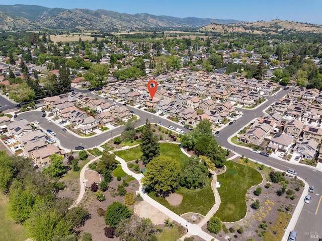 aerial view featuring a mountain view and a residential view