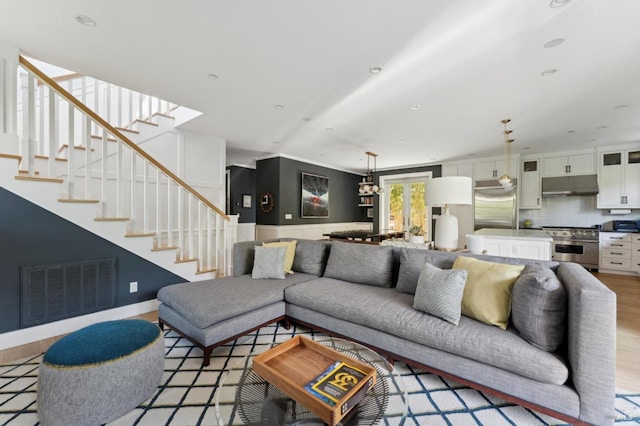 11 Heather Way, Larkspur, CA 94939 - living area with light wood finished floors and stairway