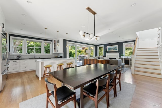 11 Heather Way, Larkspur, CA 94939 - dining space featuring light wood-style floors, stairs, a fireplace, and recessed lighting