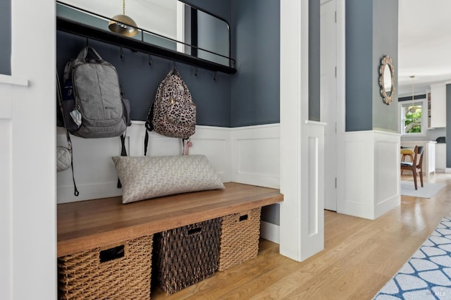 11 Heather Way, Larkspur, CA 94939 - mudroom featuring wainscoting, wood finished floors, and a decorative wall