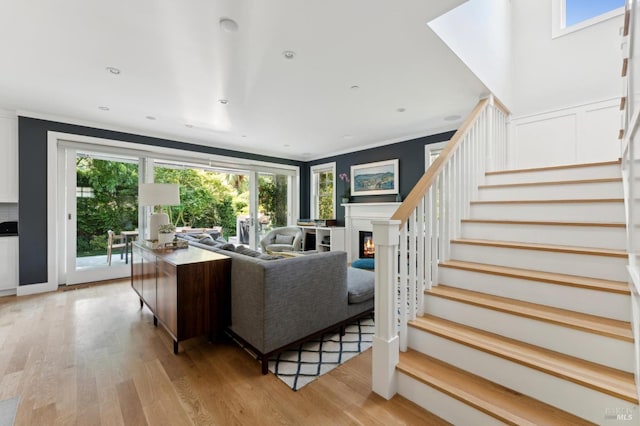 11 Heather Way, Larkspur, CA 94939 - living area featuring stairway, a glass covered fireplace, and light wood finished floors
