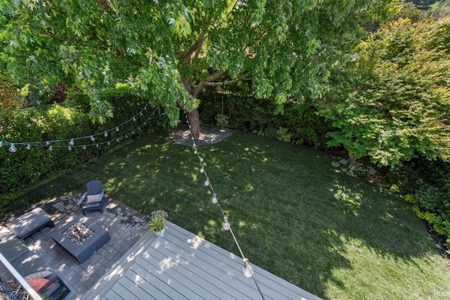 11 Heather Way, Larkspur, CA 94939 - view of grassy yard featuring an outdoor fire pit and a deck