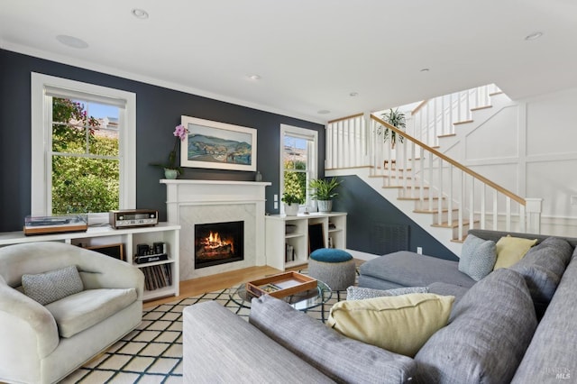 11 Heather Way, Larkspur, CA 94939 - living area featuring stairway, a fireplace, wood finished floors, crown molding, and recessed lighting