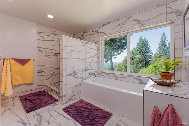 32211 Condor Rd, Willits, CA 95490 - bathroom featuring a garden tub, plenty of natural light, marble finish floor, and a walk in shower