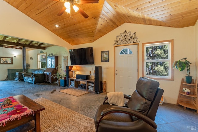 32211 Condor Rd, Willits, CA 95490 - living area with vaulted ceiling, a wood stove, wood ceiling, and a ceiling fan