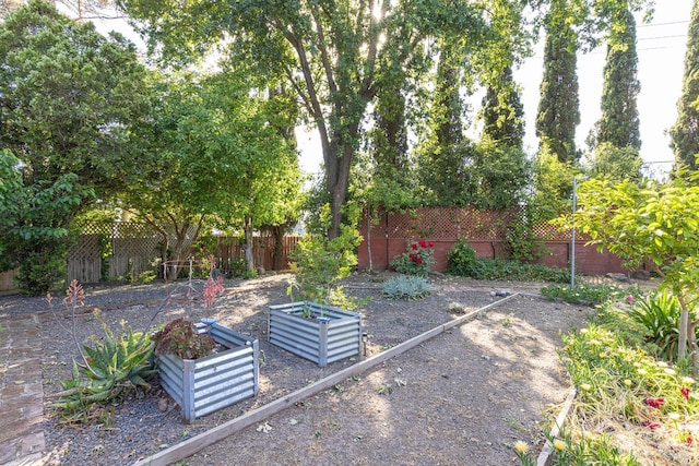 689 Rio Vista Dr, Napa, CA 94558 - fenced backyard featuring a vegetable garden