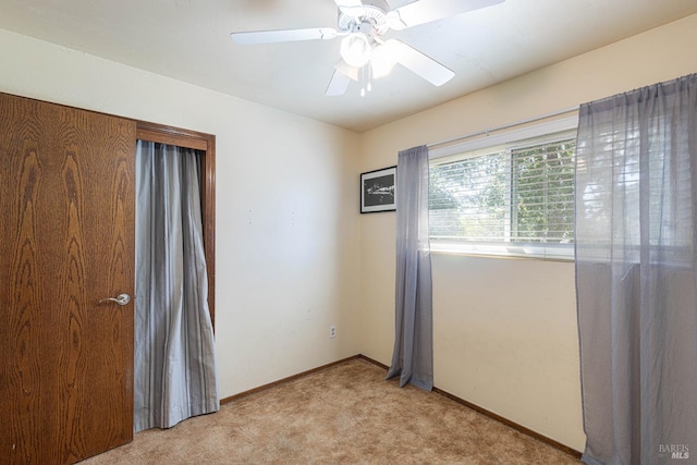 689 Rio Vista Dr, Napa, CA 94558 - spare room featuring light colored carpet, baseboards, and a ceiling fan