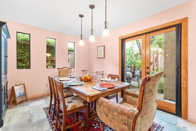 822 2nd St W, Sonoma, CA 95476 - dining area featuring french doors, baseboards, and stone tile floors