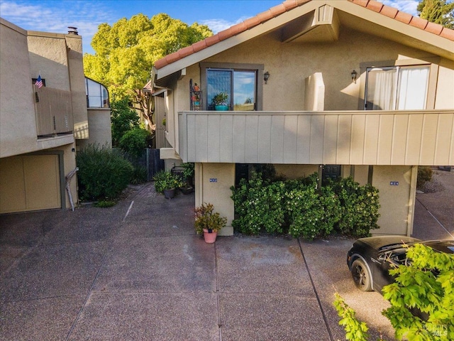 822 2nd St W, Sonoma, CA 95476 - view of home's exterior with a tiled roof and stucco siding