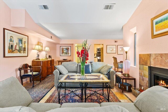 822 2nd St W, Sonoma, CA 95476 - living area with a tile fireplace and visible vents