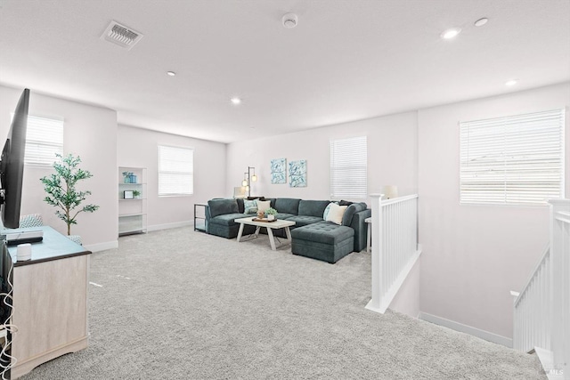 1532 Base Ct, Dixon, CA 95620 - living room featuring baseboards, recessed lighting, light carpet, and visible vents