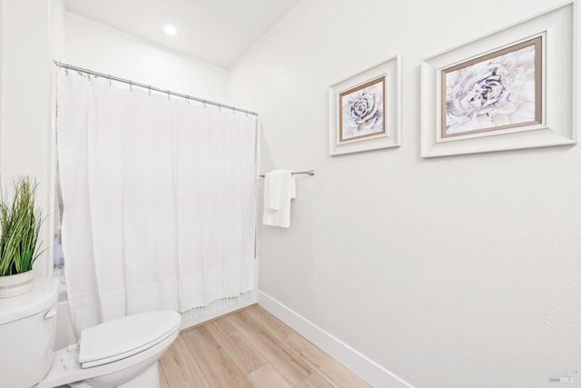 1532 Base Ct, Dixon, CA 95620 - full bathroom with toilet, wood finished floors, and baseboards