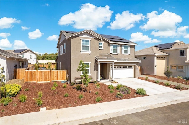 1532 Base Ct, Dixon, CA 95620 - traditional home featuring driveway, fence, a garage, stucco siding, and roof mounted solar panels