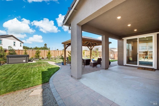 1532 Base Ct, Dixon, CA 95620 - view of patio / terrace featuring outdoor lounge area, a hot tub, a gazebo, and a fenced backyard