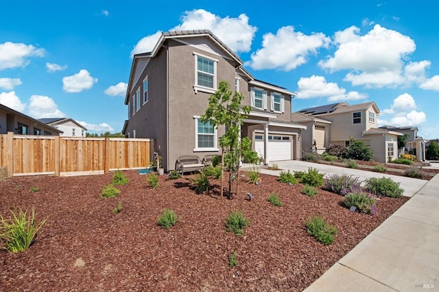 1532 Base Ct, Dixon, CA 95620 - traditional-style home with an attached garage, a residential view, stucco siding, fence, and driveway