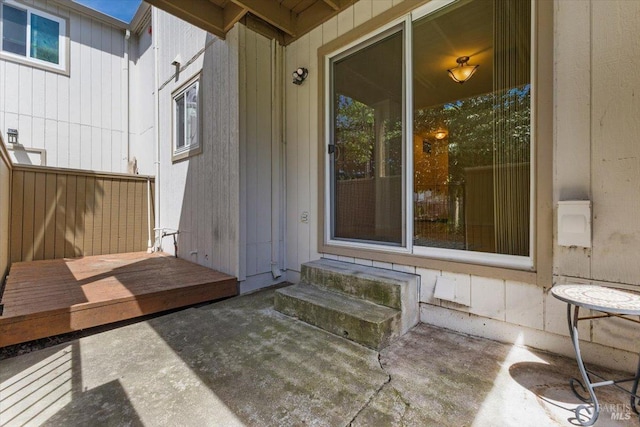 property entrance featuring a patio area