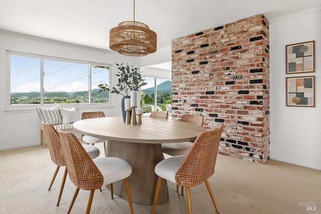 15 Junipero Serra Ave, San Rafael, CA 94901 - dining space with light carpet, baseboards, and crown molding