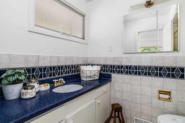 15 Junipero Serra Ave, San Rafael, CA 94901 - bathroom with tile walls, vanity, toilet, and wainscoting