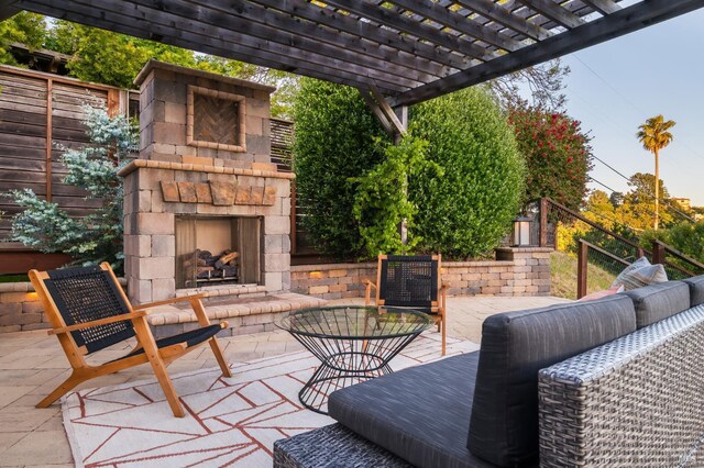 15 Junipero Serra Ave, San Rafael, CA 94901 - fenced backyard with an outdoor stone fireplace and a patio