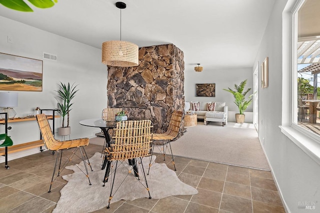 15 Junipero Serra Ave, San Rafael, CA 94901 - tiled dining room featuring healthy amount of natural light and baseboards