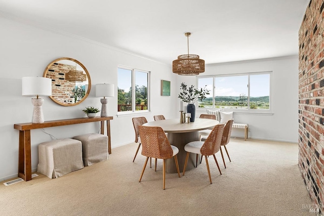 15 Junipero Serra Ave, San Rafael, CA 94901 - dining space featuring light colored carpet, plenty of natural light, baseboards, and ornamental molding