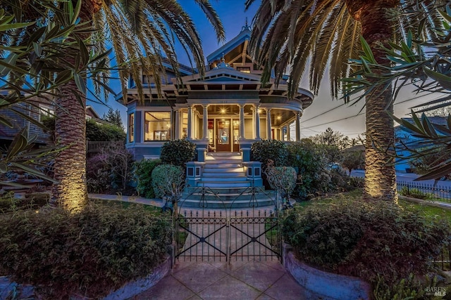 1543 Main St, Napa, CA 94559 - exterior space with a porch, a fenced front yard, and a gate