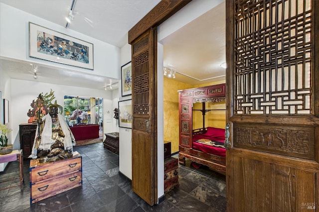 2300 S St, Eureka, CA 95501 - corridor with rail lighting and stone tile floors