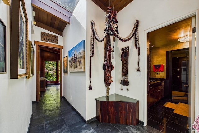 2300 S St, Eureka, CA 95501 - hallway featuring wooden ceiling, baseboards, and vaulted ceiling