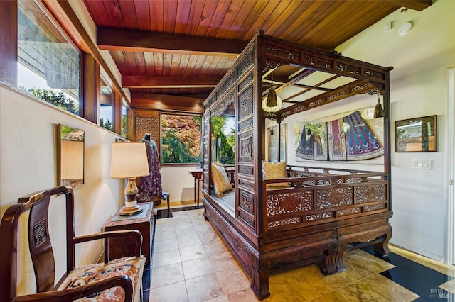 2300 S St, Eureka, CA 95501 - sitting room with wooden ceiling, healthy amount of natural light, beamed ceiling, tile patterned flooring, and baseboards