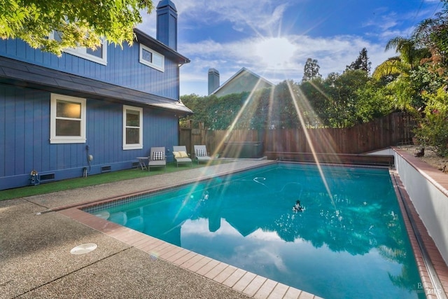 view of swimming pool featuring a fenced in pool and a fenced backyard