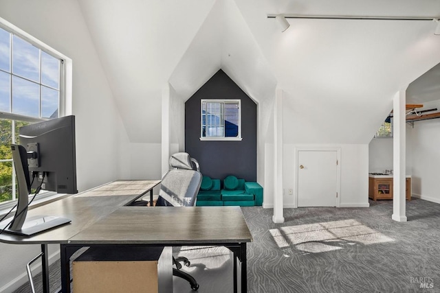 office with lofted ceiling, carpet flooring, and baseboards