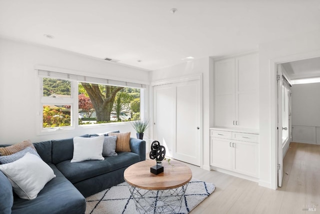 living area with light wood-style flooring