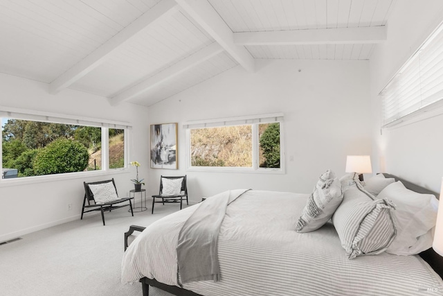 carpeted bedroom featuring baseboards