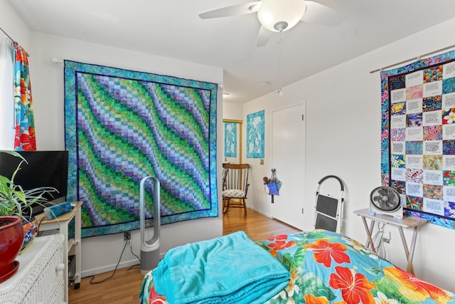 408 White Oak Dr, Santa Rosa, CA 95409 - bedroom featuring wood finished floors, ceiling fan, and baseboards