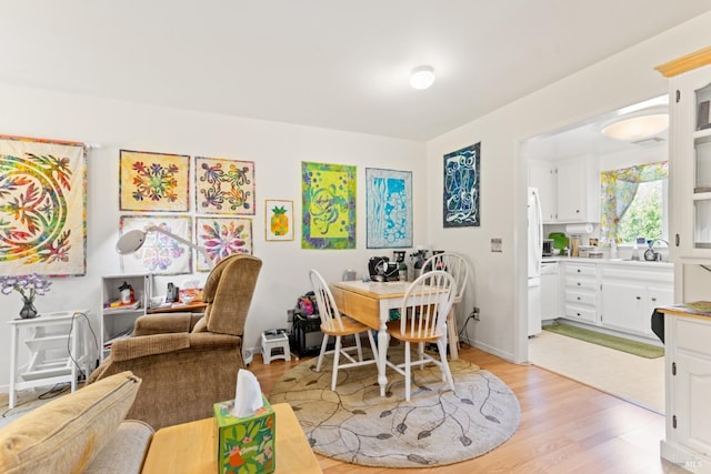 408 White Oak Dr, Santa Rosa, CA 95409 - dining room with light wood finished floors and baseboards
