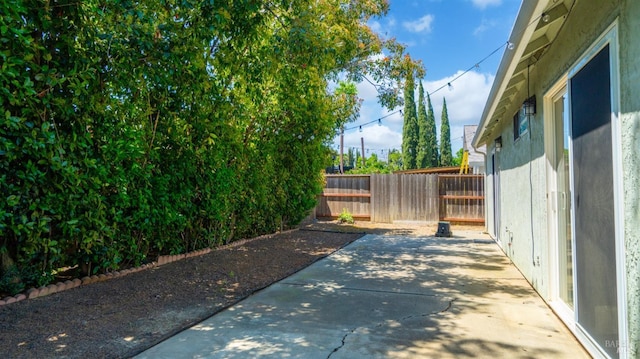 view of patio with fence