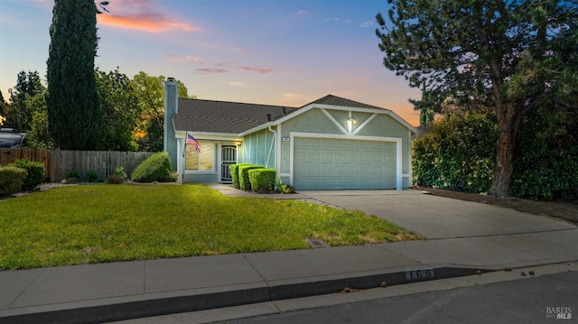ranch-style house with a garage, a chimney, concrete driveway, stucco siding, and a shingled roof