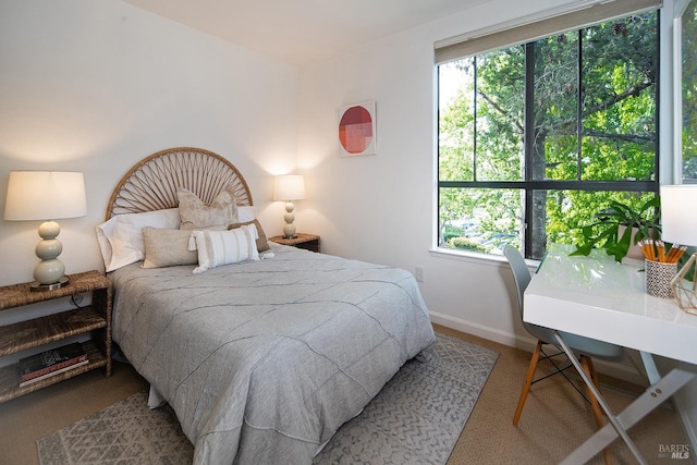 bedroom featuring baseboards