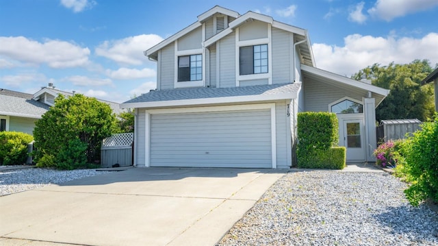 view of front of home featuring an attached garage and driveway