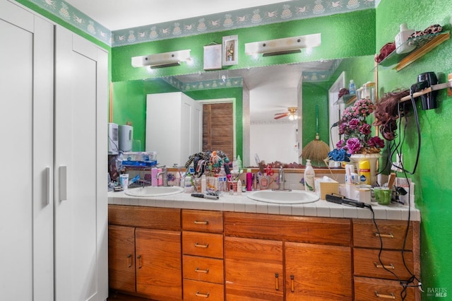 bathroom featuring double vanity