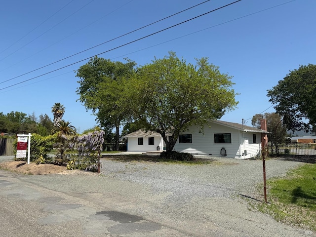 6820 Day Rd, Windsor, CA 95492 - view of front facade with fence and a chimney