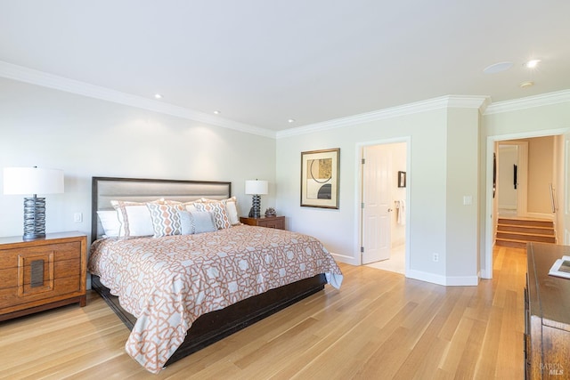 bedroom with crown molding, light wood finished floors, recessed lighting, baseboards, and ensuite bath