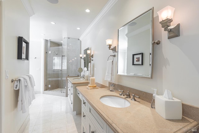 full bathroom with crown molding, a shower stall, two vanities, recessed lighting, and tile patterned floors