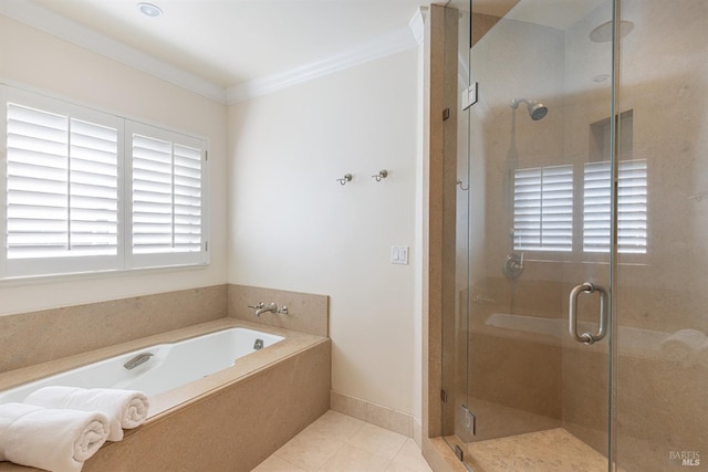 bathroom with a garden tub, a stall shower, tile patterned flooring, and crown molding